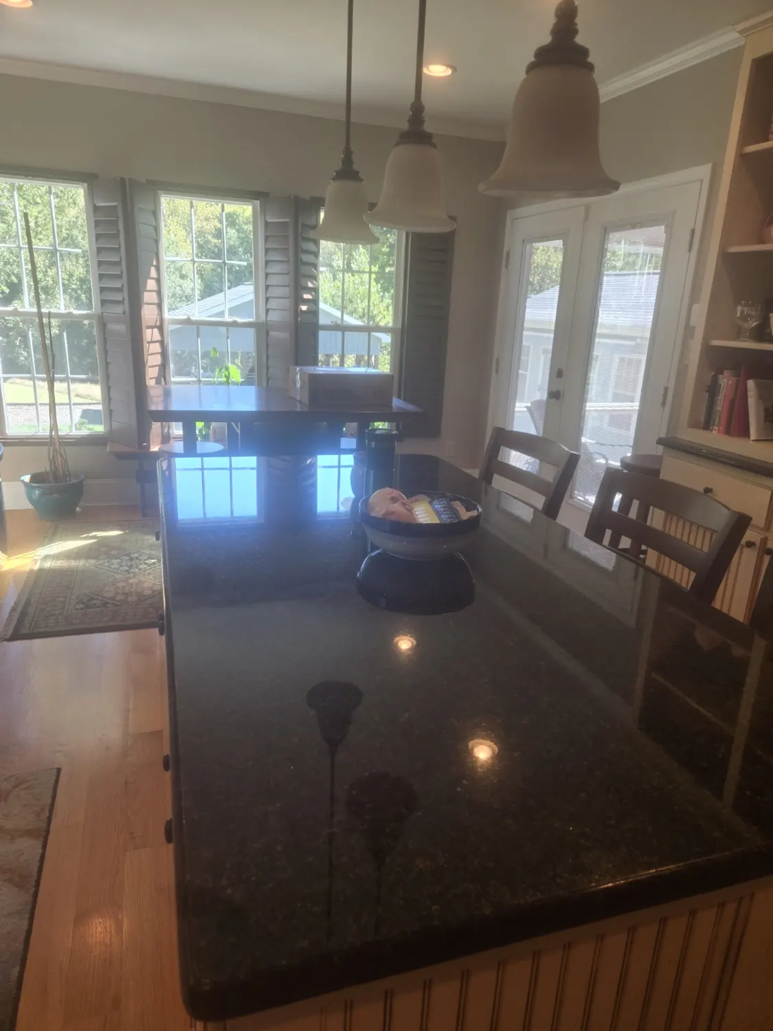 Shiny black stone countertop in a kitchen